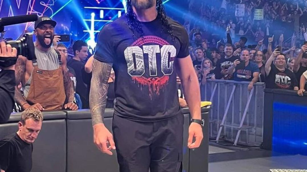 Roman Reigns punch heyman