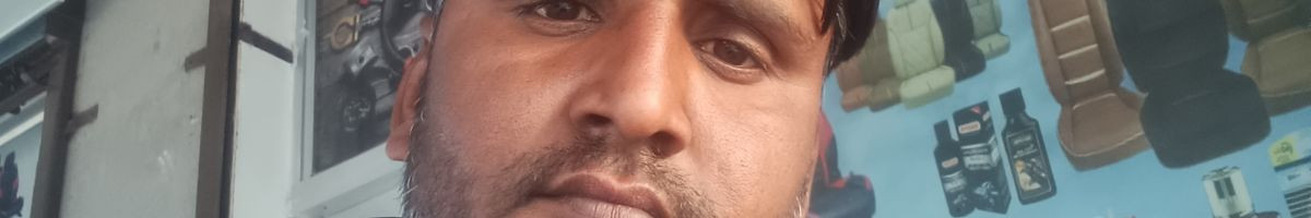 977575405