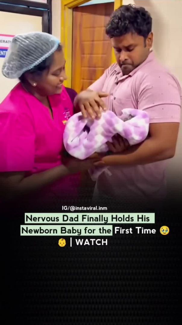 Nervous Dad Finally Holds His Newborn Baby for the First Time