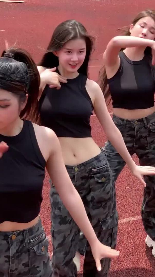 Energetic Group Dance Practice on the Running Track