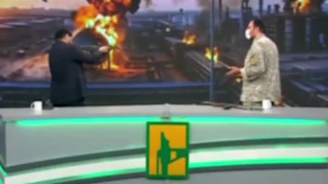 ⁣Iranian state TV presenter shot at a UAE flag on live television during a firearms training segm