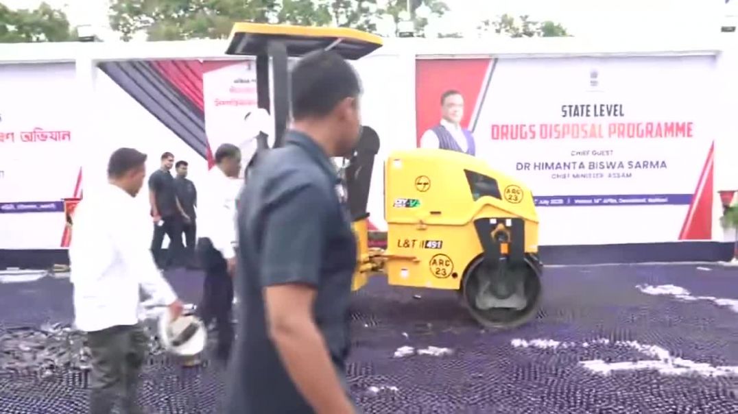 ⁣EPIC Assam CM Himanta Biswa Sarma drives bulldozer himself over drugs during drugs disposal prog